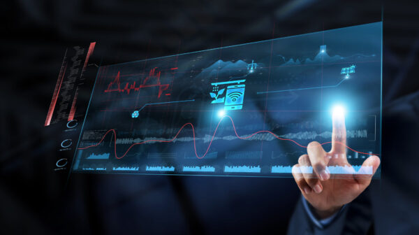 Agriculture Technology: Businessman analyzes data strategy with graph on digital screen. Precision farming, crop monitoring, smart irrigation, data analytics, sustainability, agricultural automation
