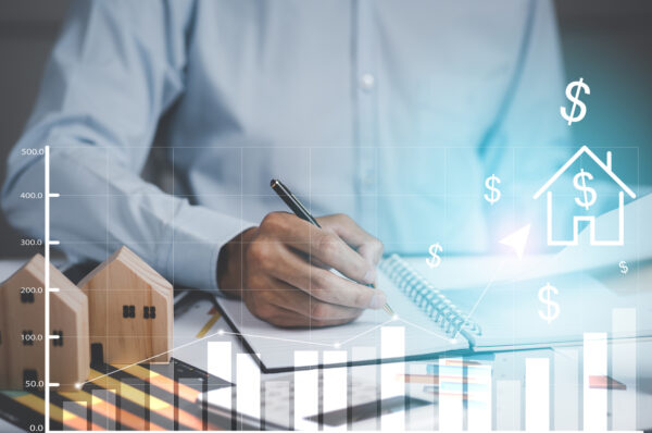 Concept financial transactions online, businessman holding pen and point at financial analyzing data while discussion, planning brand promotion budget, raising company awareness in social media